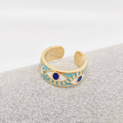 Blue enamel evil eye ring with gold-plated stainless steel and deep blue eye design for everyday protection and style
