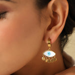 Boho-style gold plated evil eye earrings with shell design and blue charm, perfect for daily wear and gifting.