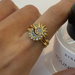 Celestial gold ring featuring sun and moon design with sparkling accents, adjustable and elegant for daily wear.