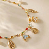 Playful Sea-Inspired Colorful Charm Bracelet, 18K gold-plated with vibrant stones and unique charms, perfect for adding a stylish touch to any outfit.
