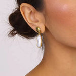 Chic Gold-Plated Contemporary Pearls Drop Earrings with bold, irregular pearls, adding modern sophistication to any outfit.