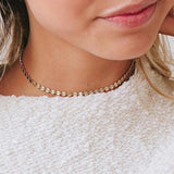Elegant gold choker necklace with cubic zirconia accents, nickel-free and lead-free for sensitive skin.