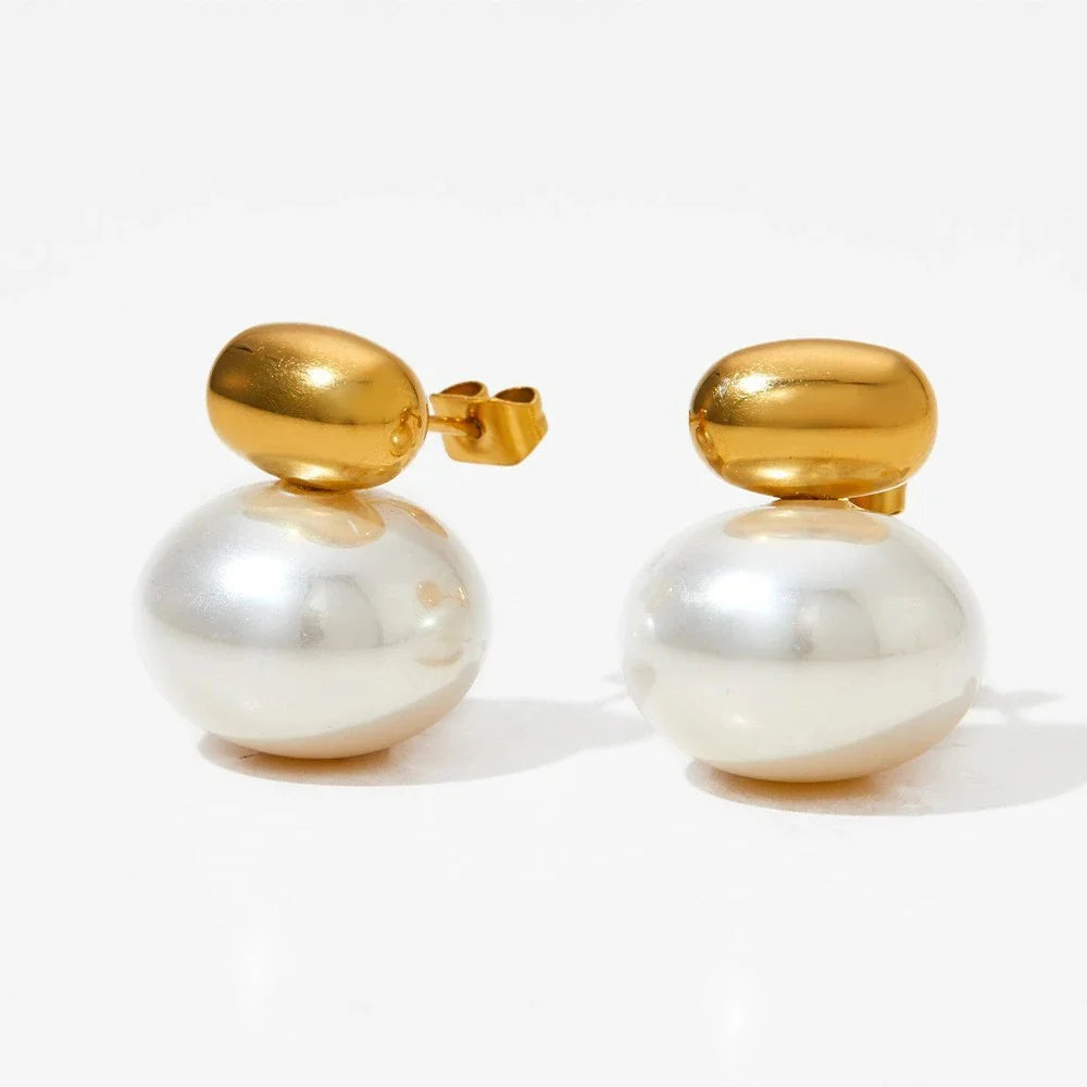 Timeless Double Pearl Stud Earrings with 18K gold plating, featuring a round white pearl and gold cap for a modern, sophisticated look.