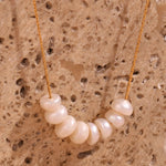 Elegant natural pearl beads necklace featuring 18k gold plated chain and freshwater pearls for timeless beauty