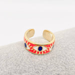 Enamel rose red evil eye ring with gold-plated stainless steel and deep blue accents, adjustable for daily wear and spiritual protection.

