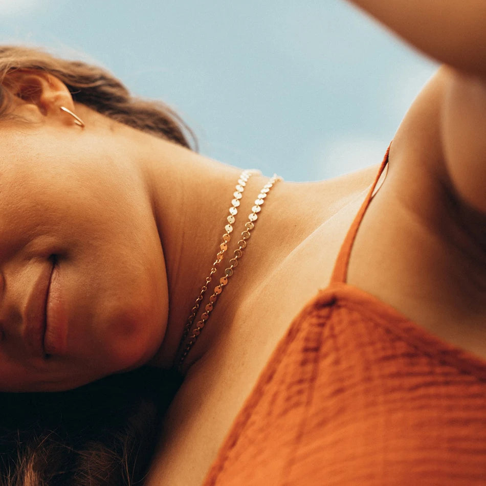 Minimalist gold choker necklace with circle chain design, great for everyday wear and effortless layering.