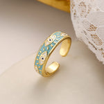 Bold blue evil eye ring in enamel and gold-plated stainless steel, a fashionable protective accessory


