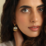 Gold stainless steel evil eye drop earrings with shell charm and blue enamel for everyday boho style and protection.