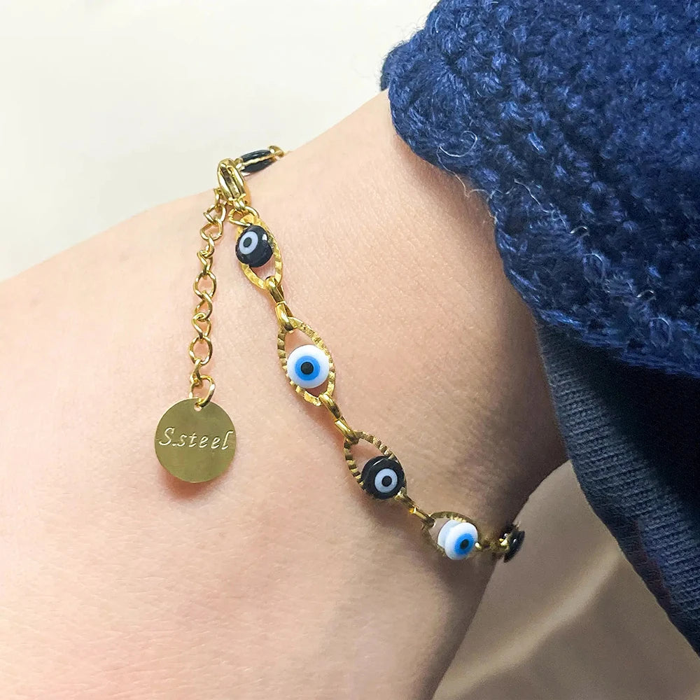 Stylish 18K gold-plated Evil Eyes bracelet for protection and good luck, adjustable slip-on rope, perfect for everyday wear and gifting.