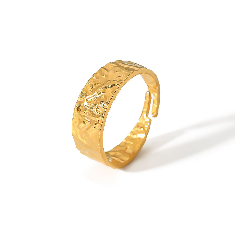 Bold adjustable gold-plated ring with a modern design, ideal as a statement piece for any finger or thumb.

