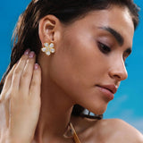 Elegant floral stud earrings with diamond-cut crystal design and 18k gold plating for a refined, feminine touch