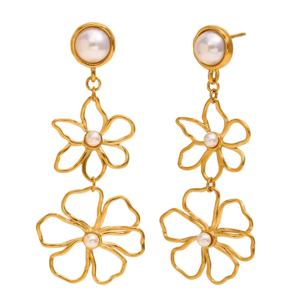 Elegant flower-shaped pearl earrings with 18k gold plating and faux pearl detail, lightweight and perfect for adding a soft, romantic touch to any outfit.