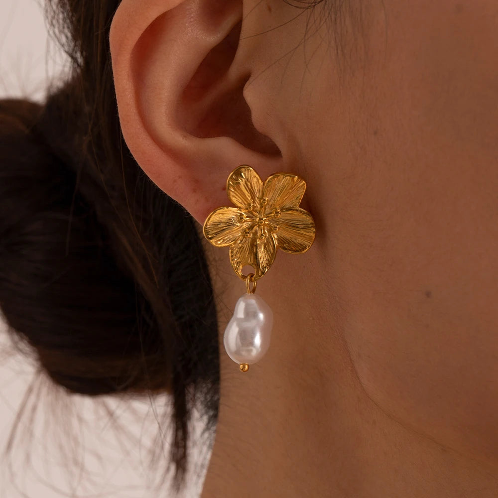 Timeless freshwater pearl flower earrings with 18k gold plating, designed for a soft, feminine style that complements any outfit.