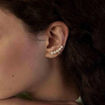 Elegant Freshwater Pearl Geometric Ear Clips, 18K gold-plated with five white pearls, perfect for adding contemporary style to your outfit.
