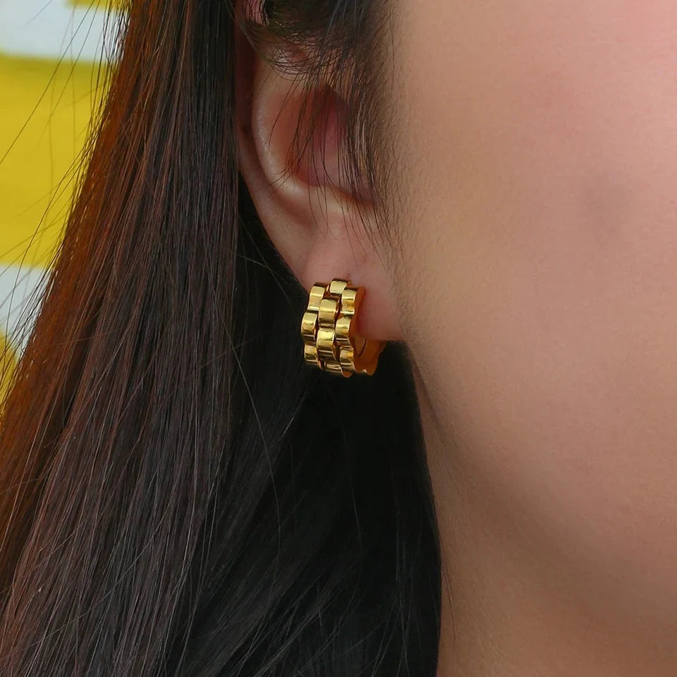 Chic geometric gold earrings with a shiny 18k plated finish, perfect for making a modern statement every day
