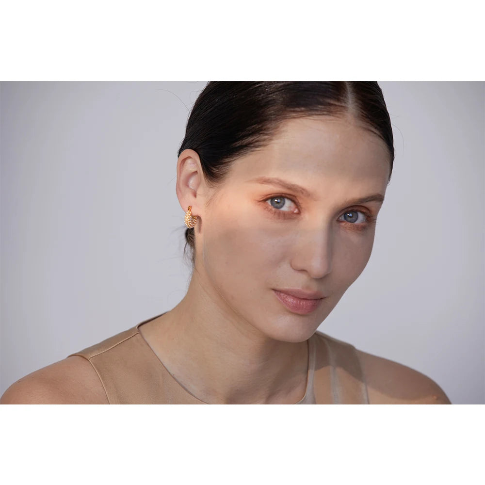 Waterproof gold beaded hoop earrings with 18k plating, perfect for timeless, everyday elegance