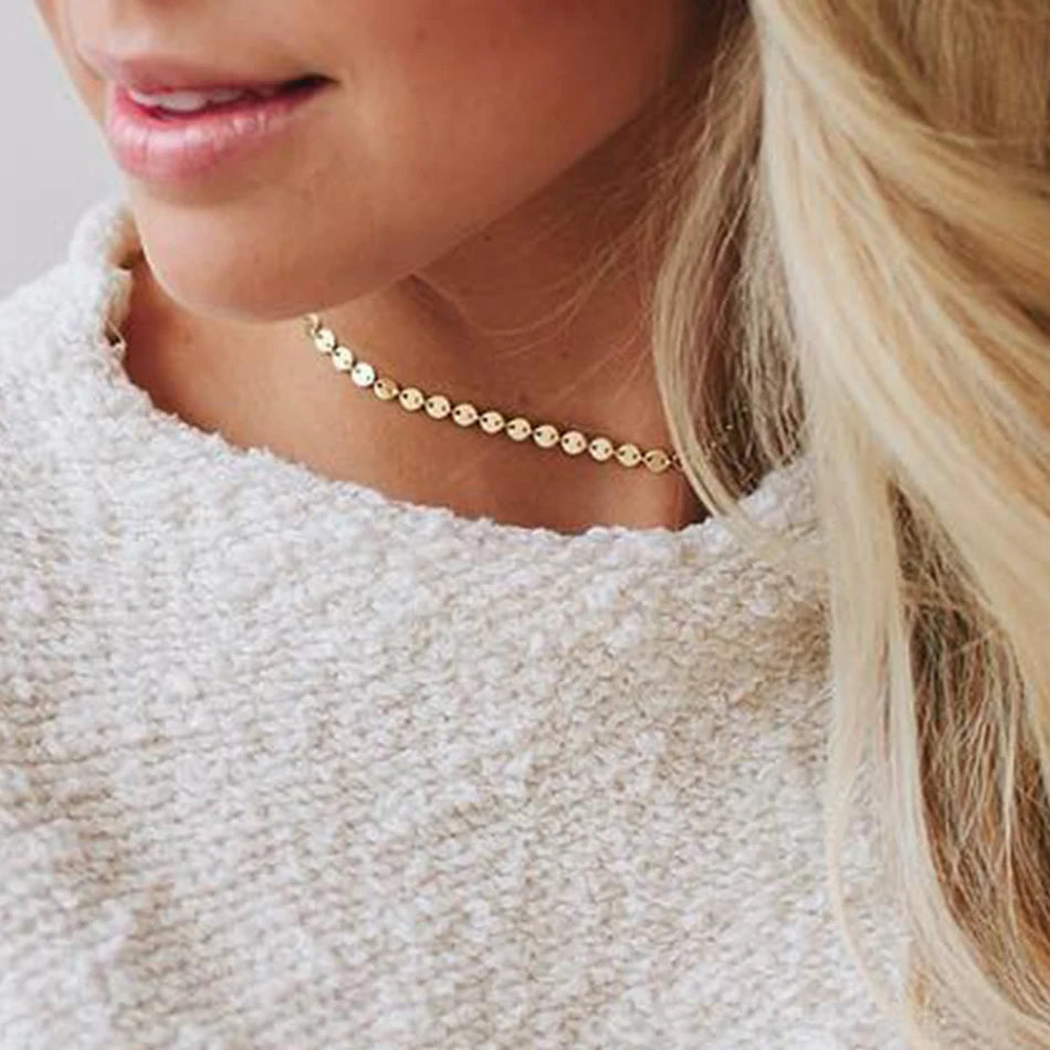 Gold circle chain choker for women, crafted from copper and zirconia, perfect for casual or dressy outfits.

