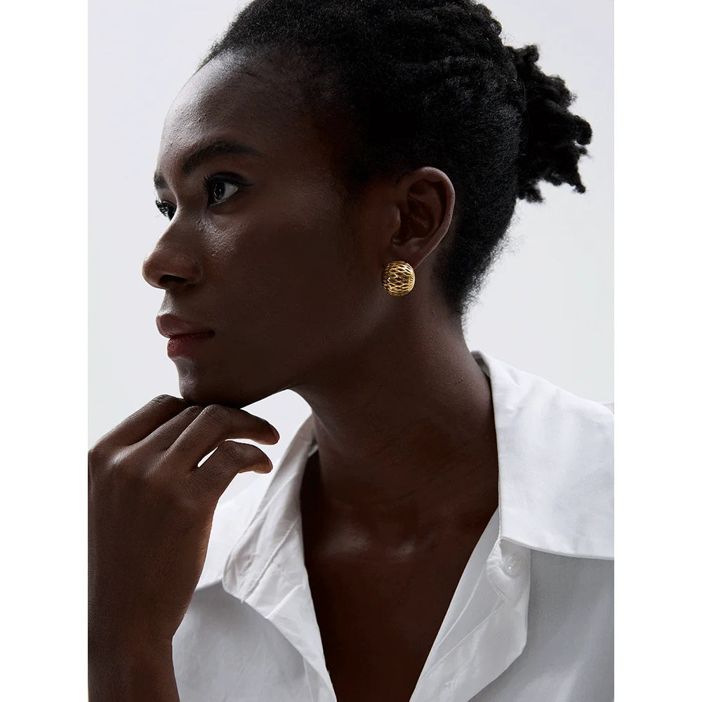 Modern gold flower stud earrings with open petal design, lightweight and perfect for daily wear.