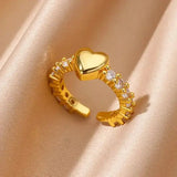 Adjustable women's gold heart ring with zircon accents, a chic symbol of love and a beautiful gift idea.