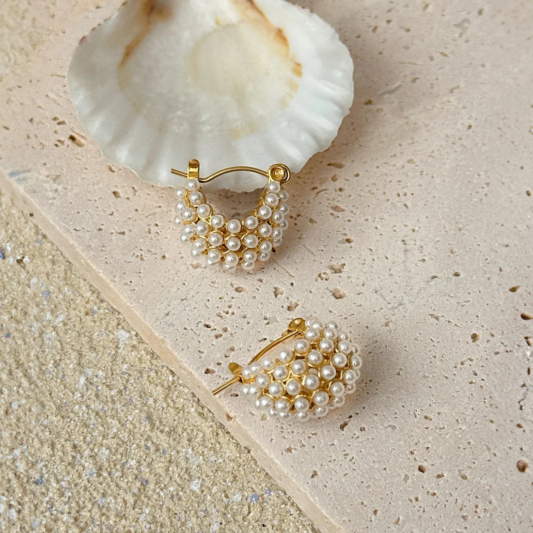 Chic Gold Mini Glow U Pearl Earrings with a 'U' shape and pearls, 18K gold-plated for a refined, elegant touch to any look.
