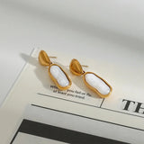 Elegant Gold-Plated Pearls Drop Earrings featuring contemporary design with irregular pearls, perfect for any occasion.