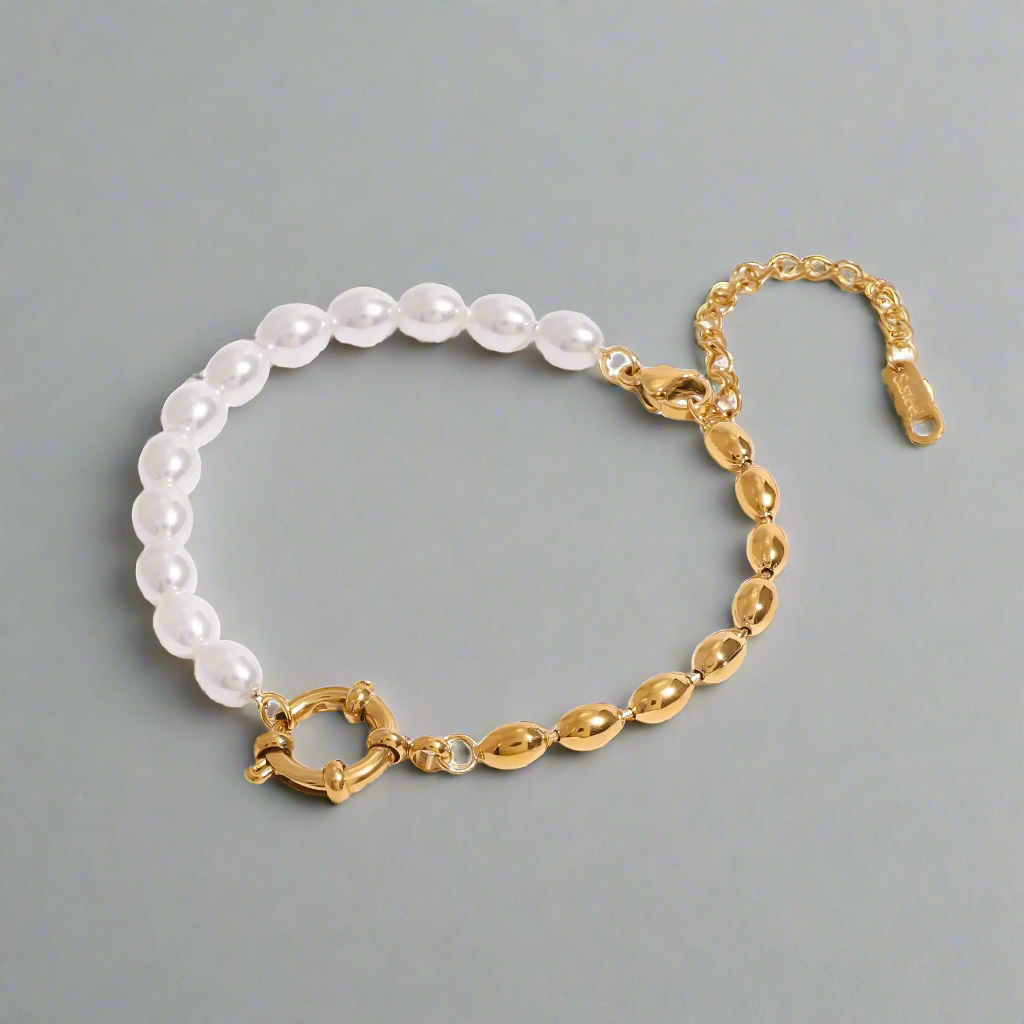 Stylish Gold-Plated Beaded Pearl Bracelet, featuring alternating pearls and beads for a sophisticated, adjustable fit.