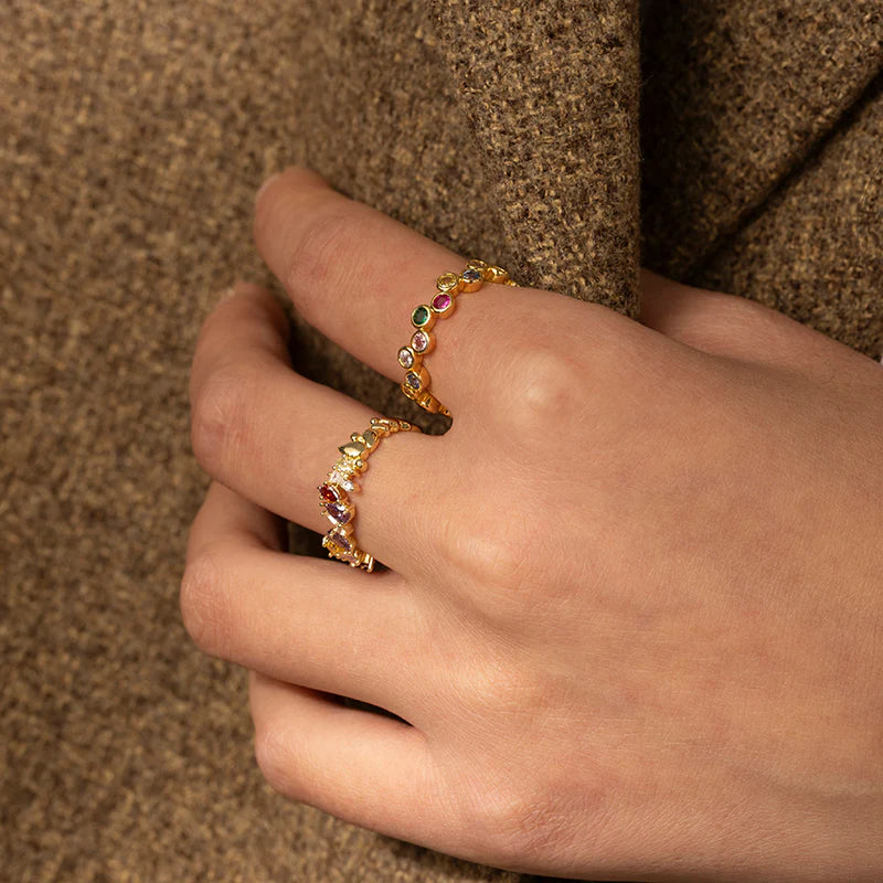 Stylish Gold-Plated Crystal Zig Zag C-Shaped Ring with a bright gemstone, perfect for adding elegance and charm to any outfit.