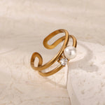Stylish Double Band Pearl Ring, 18K gold-plated, featuring a pearl and crystal for a sleek, adjustable design that adds elegance to any look.