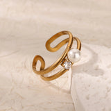 Stylish Double Band Pearl Ring, 18K gold-plated, featuring a pearl and crystal for a sleek, adjustable design that adds elegance to any look.