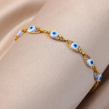 Protective Light Blue Evil Eye Bracelet with 18K gold plating, designed to ward off negativity and bring good luck.