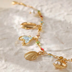 Elegant Sea-Inspired Colorful Charm Bracelet, 18K gold-plated, featuring vibrant stones and playful charms for a fun, stylish accessory.