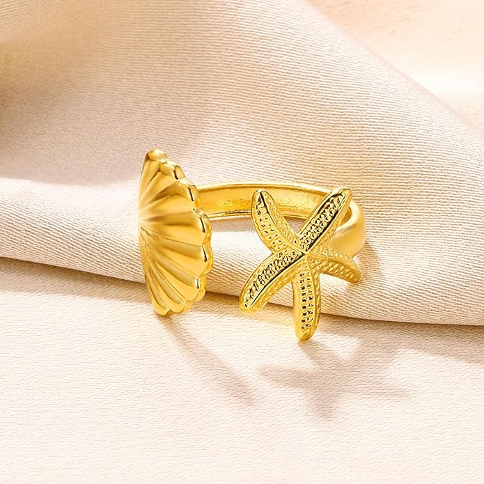 Gorgeous 18K gold-plated Starfish Shell Ring, adjustable for comfort, adding a sunny, coastal feel to any outfit.