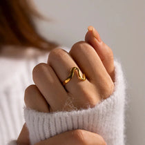 Elegant Gold Plated Wave Ring with a sleek wavy design, 18K gold-plated for a stylish, versatile look that’s perfect for any occasion.