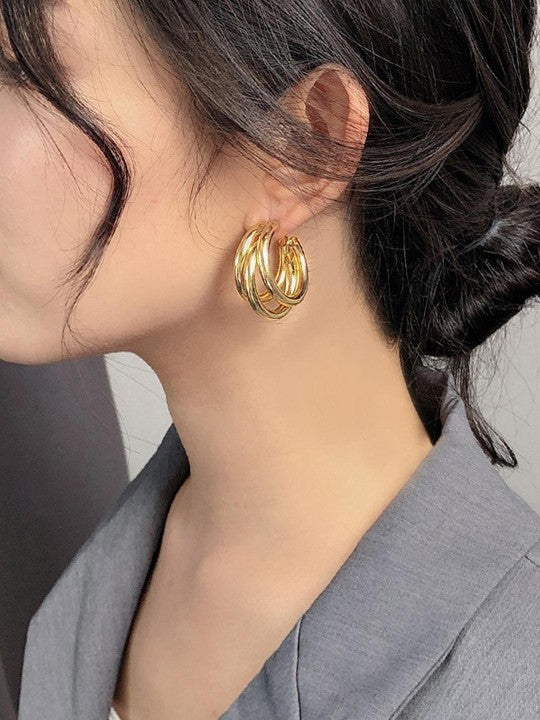 Stylish Gold Triple Hoop Earrings, 18K gold-plated with a modern layered design, perfect for casual or formal occasions.
