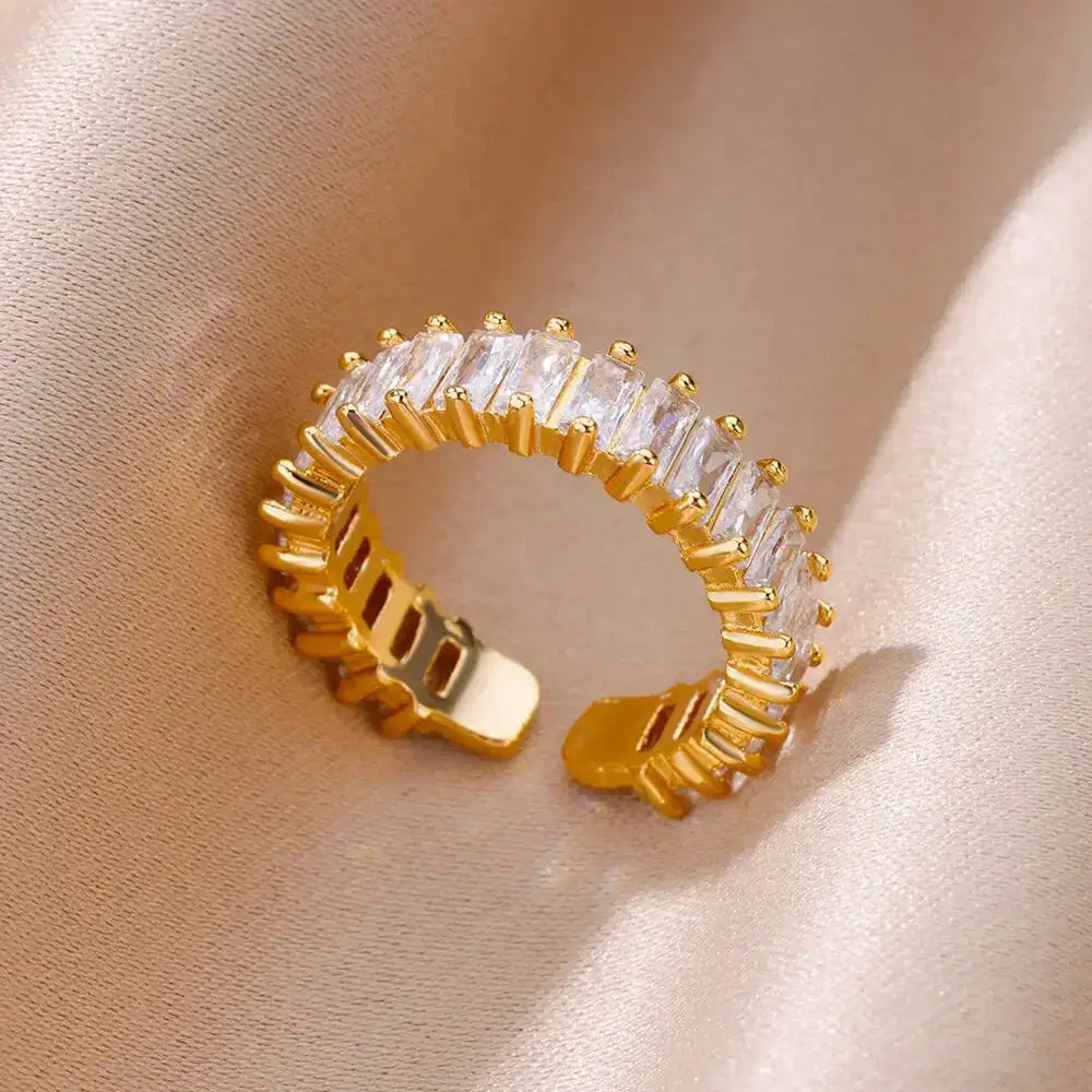 Gorgeous crystal ring worn on hand, showing elegant sparkle and gold shine, ideal for modern everyday fashion.