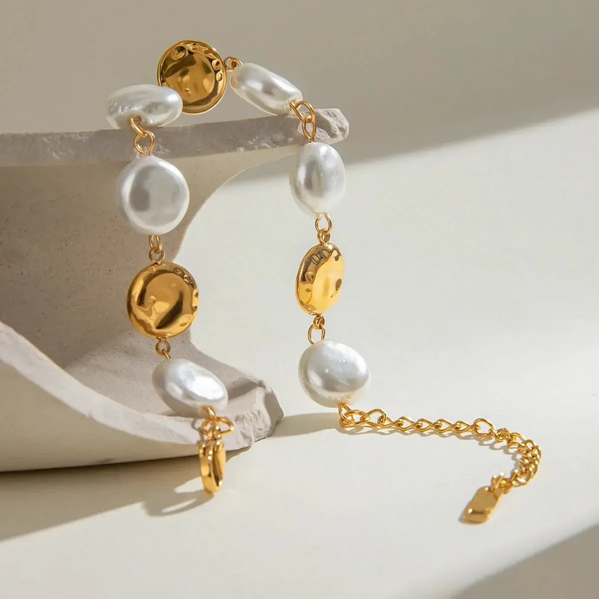 Stylish Imitation Pearl Circle Bracelet, 18K gold-plated with ivory pearls, perfect for adding a touch of elegance to any outfit.