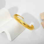 Elegant Lady's Evil Eye Cuff Bracelet, 18K gold-plated with an eye-catching design, combining protection and sophistication for any outfit.