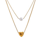 18k gold layered necklace with pearl and heart charm, elegant and romantic design perfect for daily wear or gifting