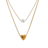 18k gold layered necklace with pearl and heart charm, elegant and romantic design perfect for daily wear or gifting