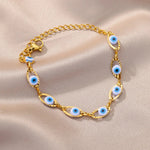 Light Blue Evil Eye Bracelet with gold-plated stainless steel, a stylish accessory that brings protection and good vibes.