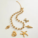 Elegant Luxe Gold Knot Necklace, 18K gold-plated with woven knot design, symbolizing connection and strength, perfect for adding sophistication to any outfit.