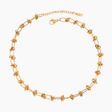 Beautiful Luxe Gold Knot Necklace, 18K gold-plated with a unique woven knot design, perfect for adding meaning and elegance to your style.