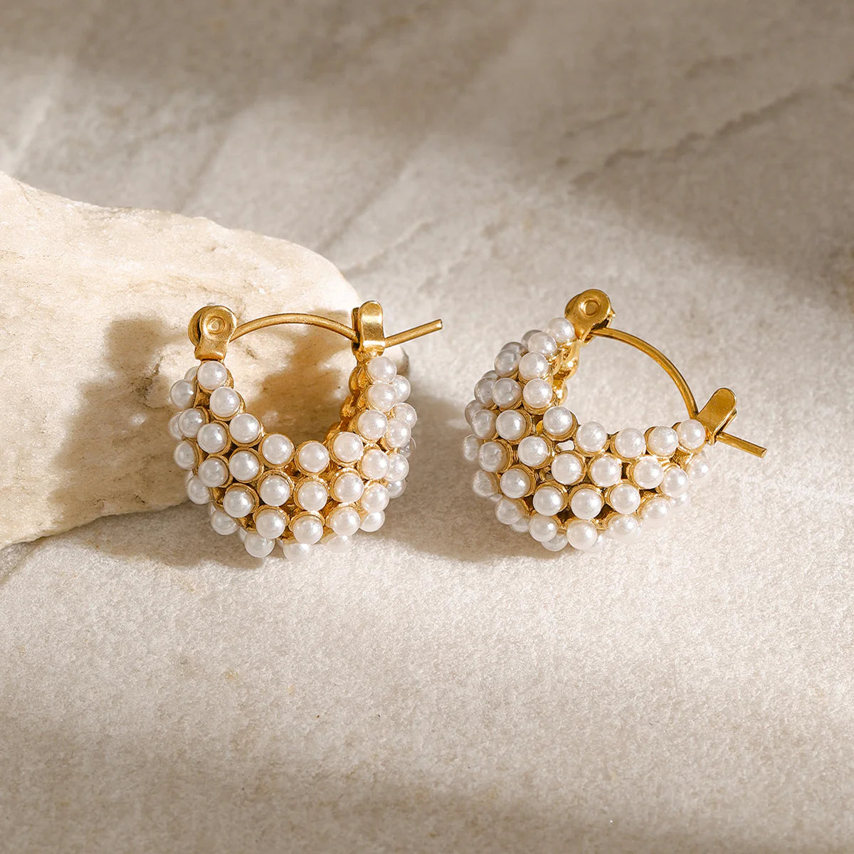 Elegant Mini Glow U Pearl Earrings, 18K gold-plated hoops with a stylish 'U' shape and pearls, perfect for adding a touch of luxury to any outfit.