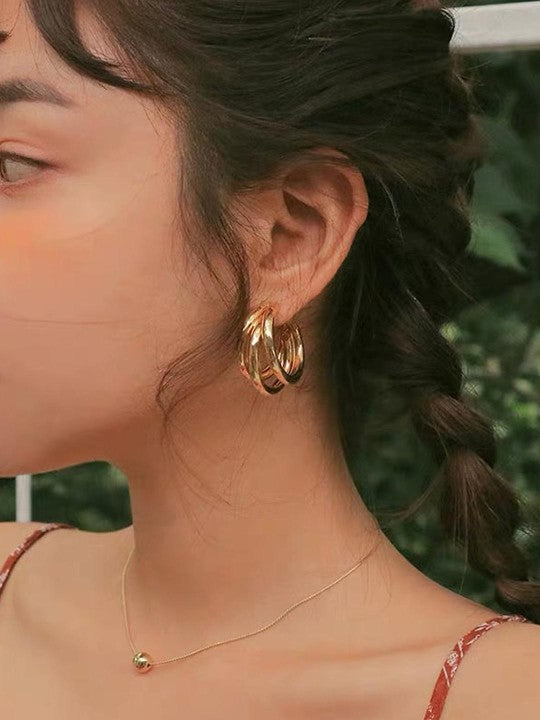 Modern Triple Hoop Gold Earrings, 18K gold-plated with a stylish layered design, perfect for adding elegance to any outfit.