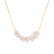 Natural pearl beads necklace with freshwater pearls on a delicate gold chain, perfect for adding elegance to everyday style