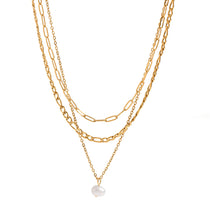 Elegant Natural Pearl Triple Chain Necklace, 18K gold-plated with delicate chains and a pearl drop, perfect for everyday or special occasions.