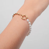 Elegant Pearl Beaded Bracelet with gold-toned beads, 18K gold-plated, offering a refined and timeless aesthetic.