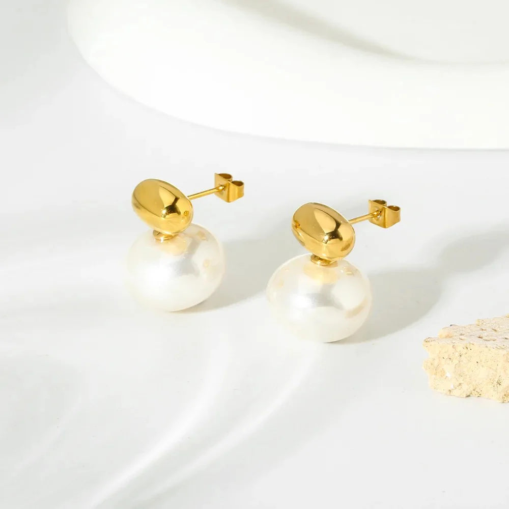 Beautiful Double Pearl Gold Stud Earrings, 18K gold-plated with a shiny white pearl and gold cap, offering a chic and modern design.