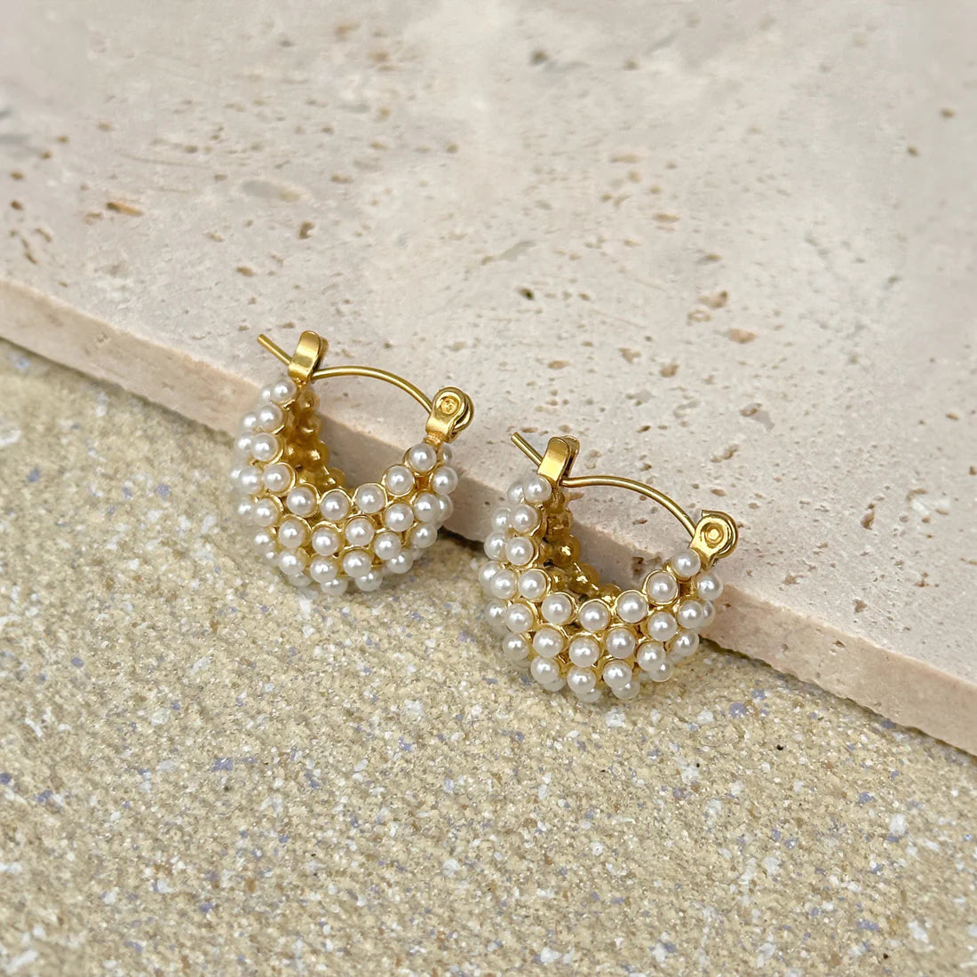 Timeless Pearl Mini Glow U Earrings, 18K gold-plated with a smooth 'U' shape, offering a subtle touch of luxury to your style.