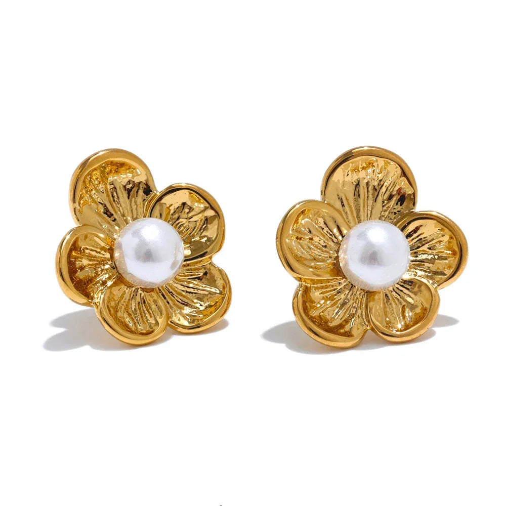 Radiant pearl flower earrings with gold petals and elegant oversized pearl detail

